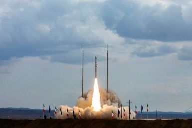 Iran successfully test-launches a three-stage solid-fuel rocket capable of carrying satellites into space on November 5, one of a series of recent advances it has boasted in its aerospace programme