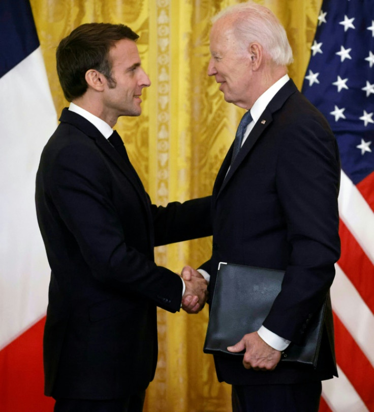 US President Joe Biden and French President Emmanuel Macron hold a joint press conference in the East Room of the White House