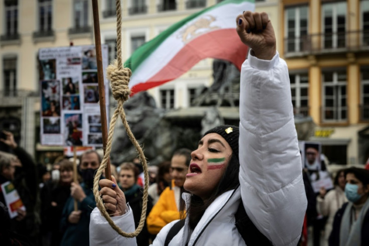 A protester holds a gallows rope during a rally in the French city of Lyon on January 8 against the Iranian regime