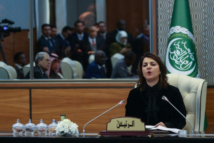 Najla al-Mangoush, foreign minister in the Tripoli-based administration, condemned 'attempts by certain sides to crush Libyans' desire to transform Arab solidarity into a reality'