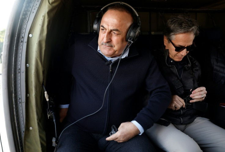 US Secretary of State Antony Blinken (R) accompanied his Turkish counterpart Mevlut Cavusoglu (L) in a helicopter to view the damage