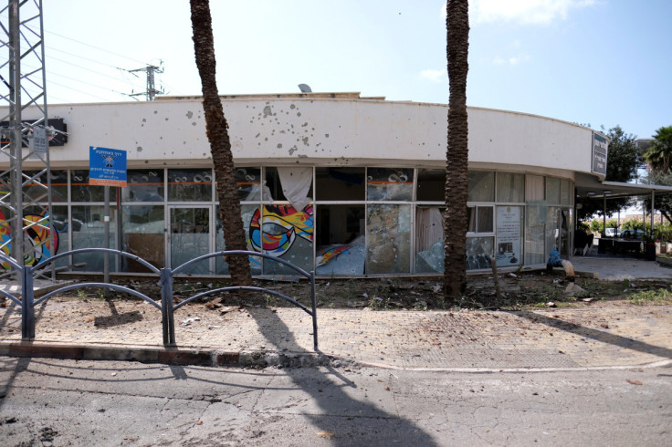 A damaged building of a bank is seen following incoming rockets from Lebanon to Israel in Shlomi, northern Israel