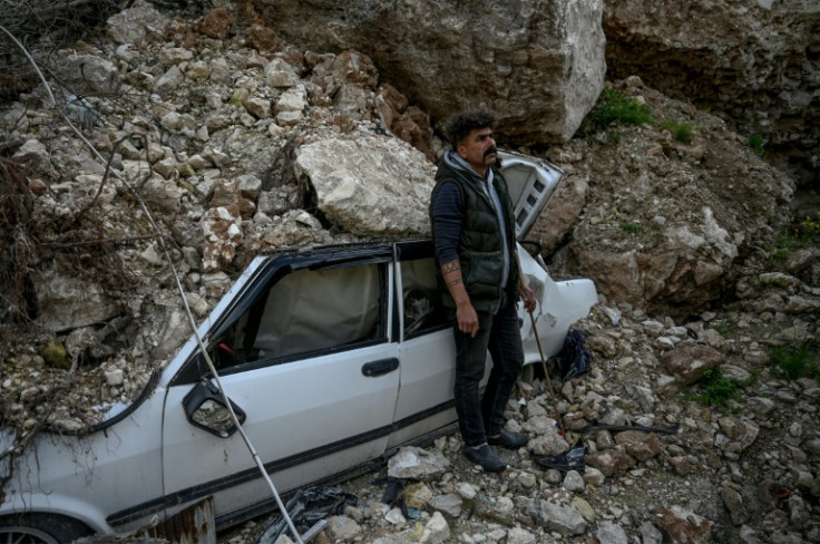 Cuma Zobi and his children were nearly crushed by boulders that came crashing down in the earthquake
