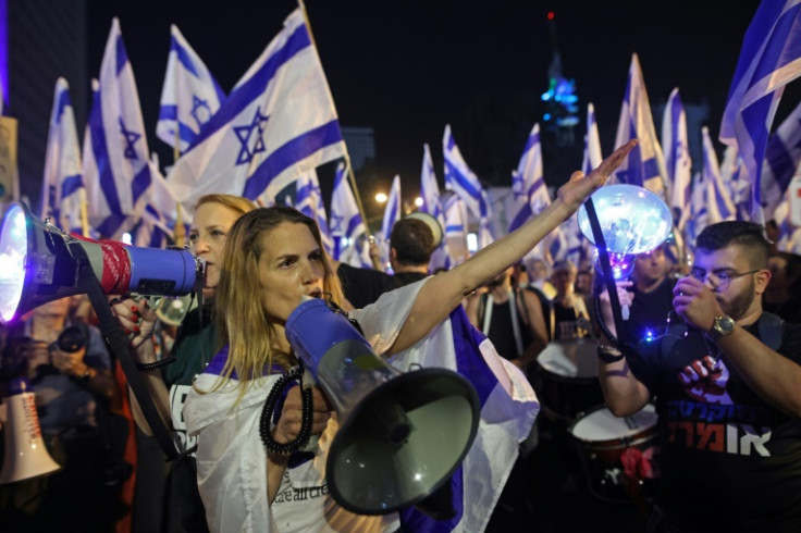 Protesters demonstrate against the government's judicial reform proposals in Tel Aviv