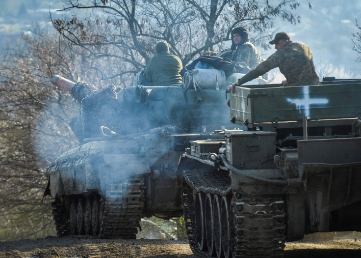 Ukrainian service members ride tanks near the front line city of Chasiv Yar
