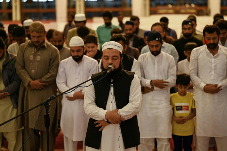 Noor ul Islam (C) beat 400 other candidates to become the muezzin responsible for performing the Islamic call to prayer at the grand Faisal Mosque in Islamabad