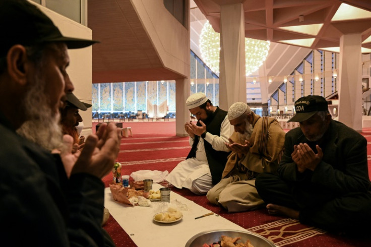 Devotees travel for miles to hear the call at Faisal Mosque, peer through the windows to watch Noor ul Islam at work and ask for selfies afterwards