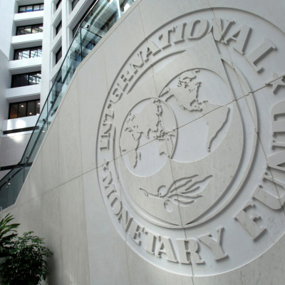 The International Monetary Fund logo is seen inside its headquarters at the end of the IMF/World Bank annual meetings in Washington