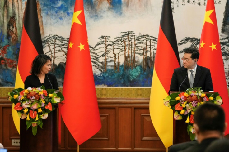 Chinese Foreign Minister Qin Gang (R) and Germany's Foreign Minister Annalena Baerbock attend a joint press conference in Beijing