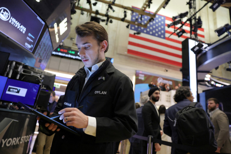 Traders work on the trading floor at the New York Stock Exchange (NYSE) in New York City