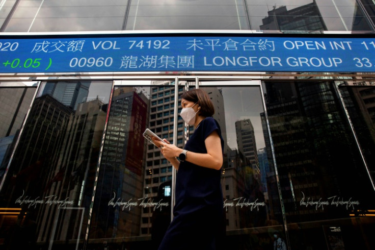 Asian markets were mostly down on Wednesday following a tepid lead from Wall Street