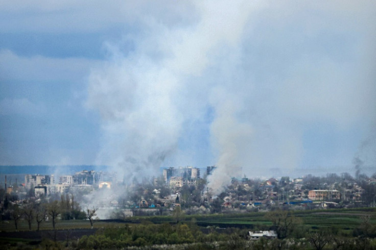 Smoke billows over the town of Bakhmut