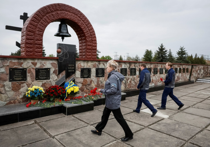 Staff attend a ceremony marking the 37th anniversary of the Chornobyl disaster at the Chornobyl Nuclear Power Plant in Chornobyl
