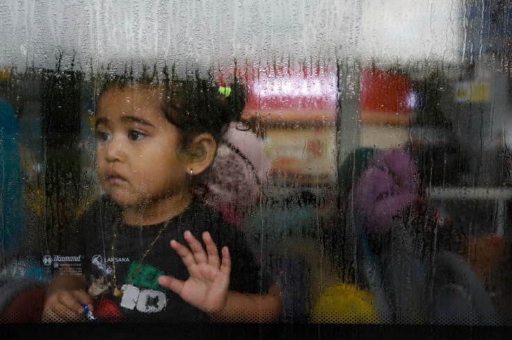 Indonesian citizens evacuated from Sudan arrive at the Soekarno-Hatta Airport in Tangerang