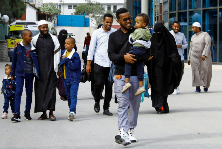 Evacuees from war-torn Sudan arrive at the Aden Abdulle International Airport in Mogadishu