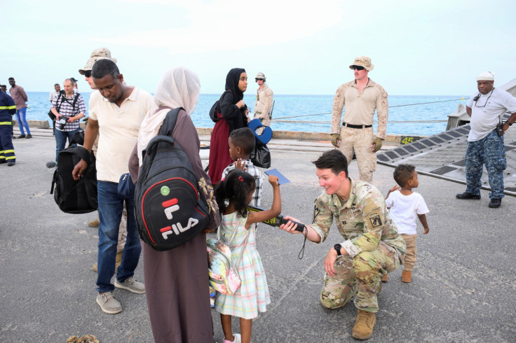 American nationals arrive for evacuation from the port in Port Sudan