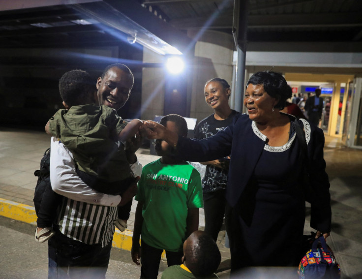 Zimbabweans evacuated from Sudan to escape the conflict arrive at Robert Gabriel Mugabe International airport in Harare