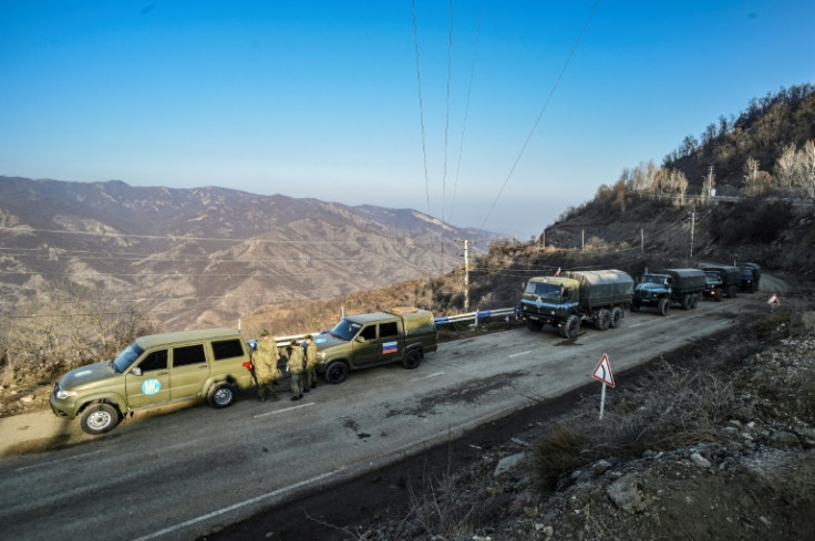 Russian peacekeepers on the Lachin corridor linking Armenia with Nagorno-Karabakh in Azerbaijan in 2020; Azerbaijan placed a checkpoint on the road recently, hindering access to the disputed enclave