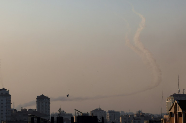 Trails of smoke are seen as rockets are fired from Gaza towards Israel on May 2, 2023