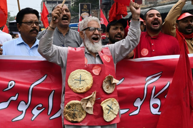 Union activists march during a May day protest in Lahore. Runaway inflation has send prices soaring for Pakistanis -- especially the poor and marginalised
