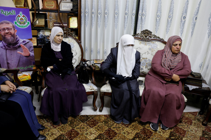 Palestinians gather at the house of Palestinian prisoner Khader Adnan near Jenin