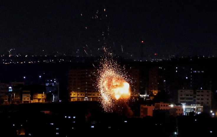 An explosion is seen, following an Israeli air strike in Gaza