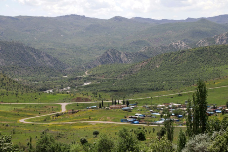 One villager says the presence of the armed men means they have been unable to go to fields or graze animals