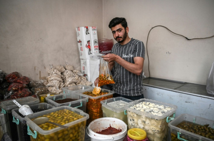 'We're not doing anything wrong here,' said Syrian caterer Mohamed Utbah