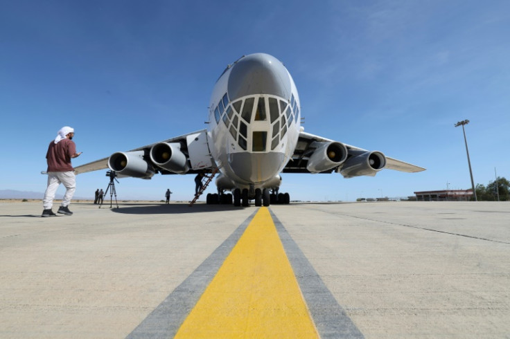 A plane delivers aid from the United Arab Emirates in Port Sudan