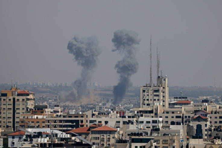 Smoke billows following Israeli strikes on Gaza City on May 10, 2023