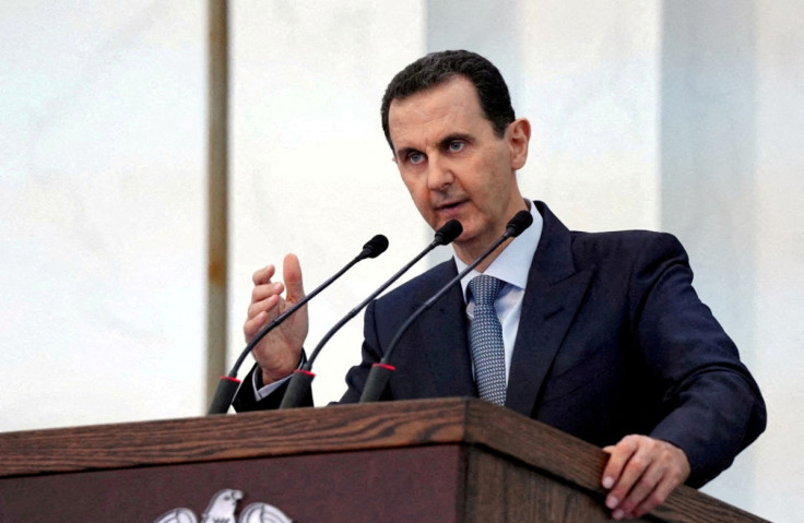Syria's President Bashar al-Assad addresses the new members of parliament in Damascus