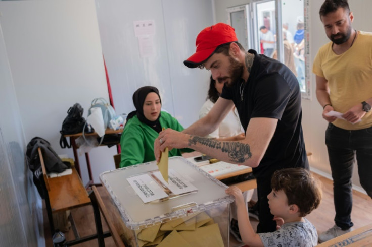Voter cast ballots at an improvised polling in the southern Turkish city of Antakya, destroyed by this year's devastating earthquake