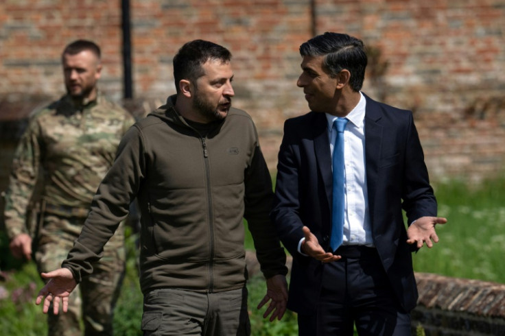 Ukraine's President Volodymyr Zelensky, seen here with British PM Rishi Sunak in England, has not confirmed that he will attend the Council of Europe summit