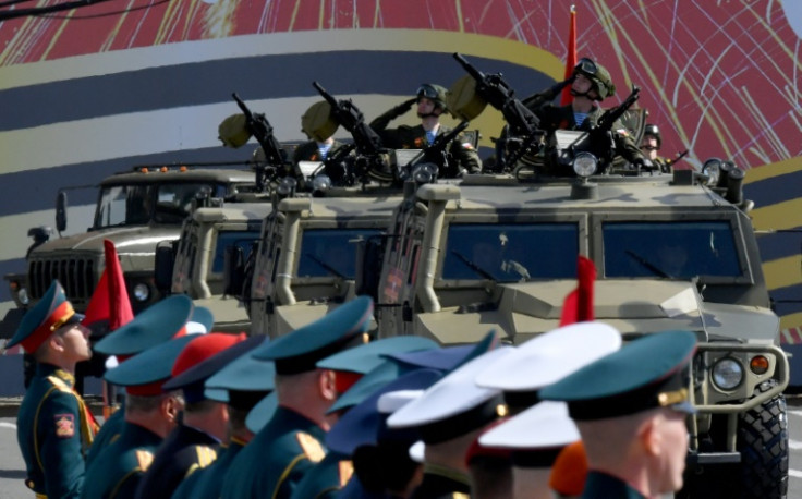 Military hardware rolls through Dvortsovaya Square during a Victory Day military parade in central Saint Petersburg on May 9, 2023