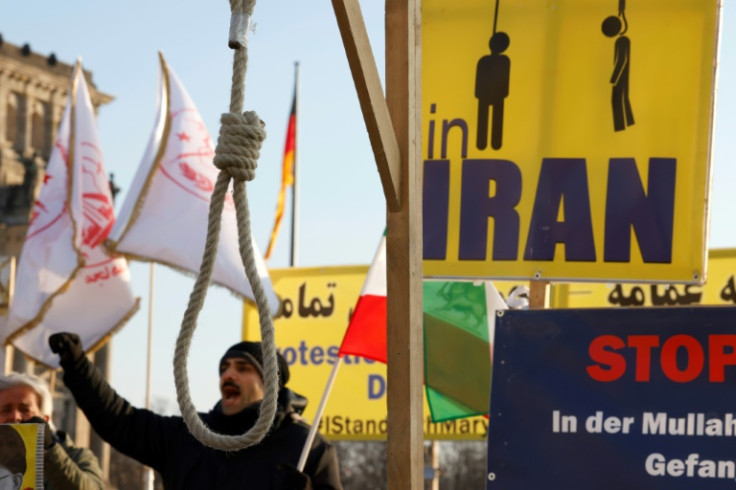 Activists demonstrate in front of Germany's parliament building on January 19, in solidarity with anti-government protesters in Iran