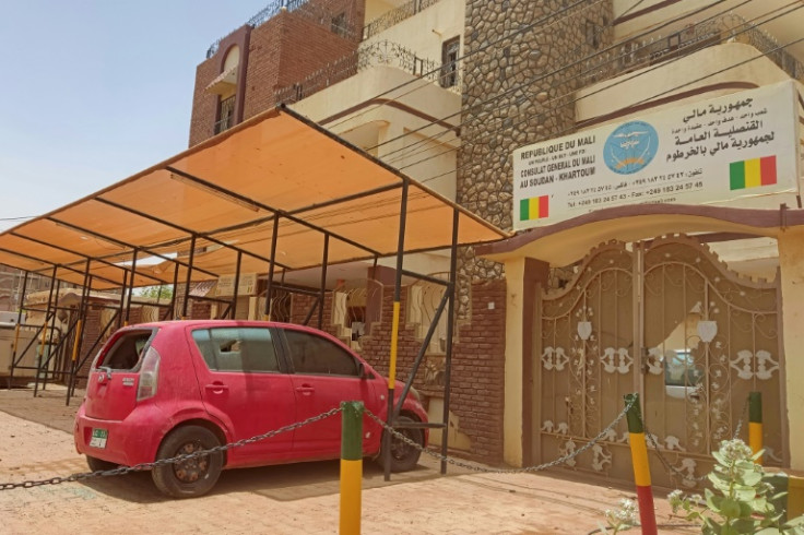 Bullet holes riddle the facade of the Malian consulate in Khartoum