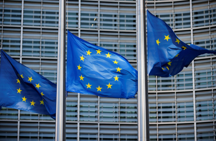 European Union flags fly outside the European Commission headquarters in Brussels