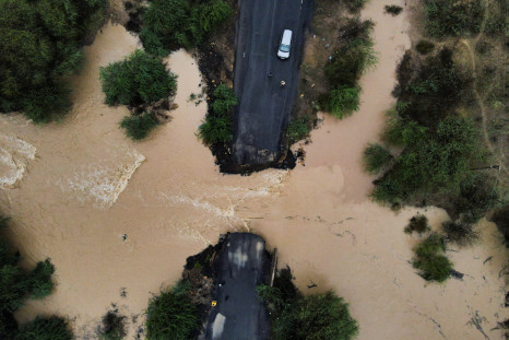 Drone view of a broken bridge during the aftermath of Cyclone Biparjoy after it made landfall, along the Naliya-Bhuj highway, in the western state of Gujarat,