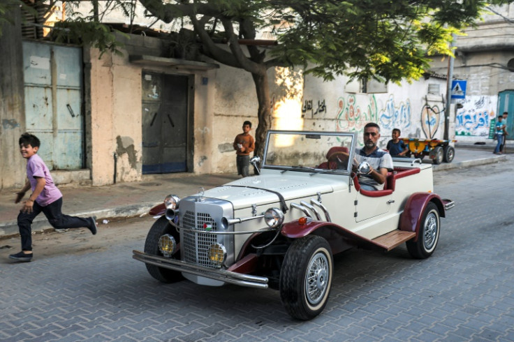 Munir al-Shandi drives his Gazelle down a Gaza street