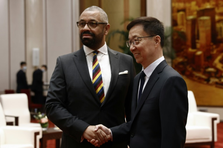 James Cleverly (L) is the first UK foreign minister to visit China for five years