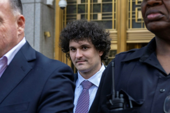 Former FTX chief Sam Bankman-Fried, seen here after a bail hearing in New York in July, has struggled to explain his behaviour in the dying days of his crypto empire