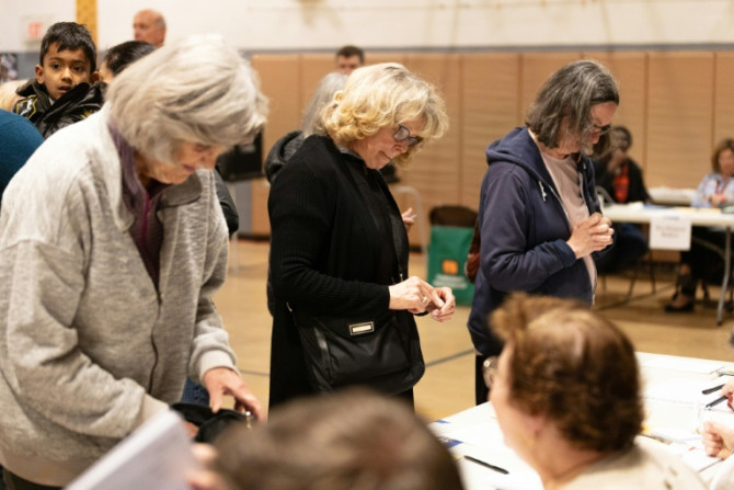 Voters check in at a polling location in Columbus, Ohio, on November 7, 2023