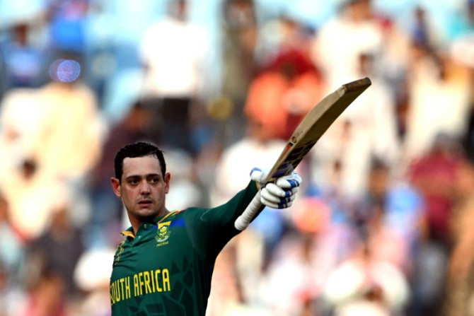 Dangerman: South Africa's Quinton de Kock celebrates after scoring a century against Australia in the group stage win in Lucknow