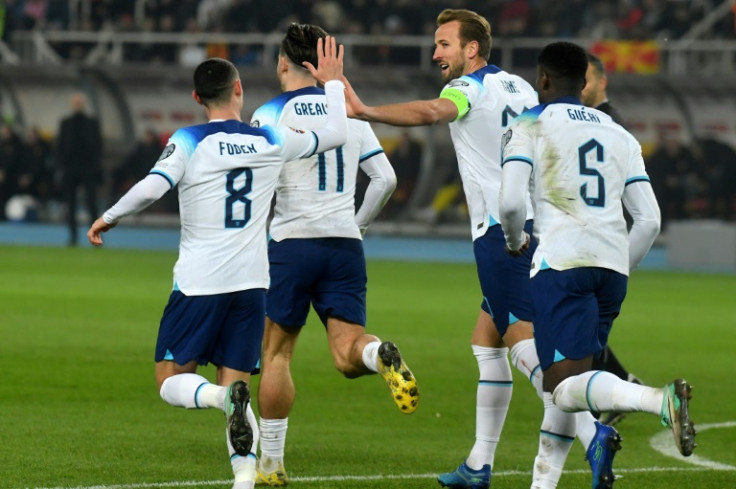England players celebrate after their equaliser against North Macedonia in Skopje