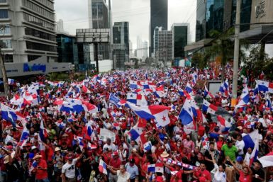People celebrate the Supreme Court's ruling that declared the contract with Canadian mining company First Quantum and its subsidiary Minera Panama as "unconstitutional," in Panama City on November 28, 2023