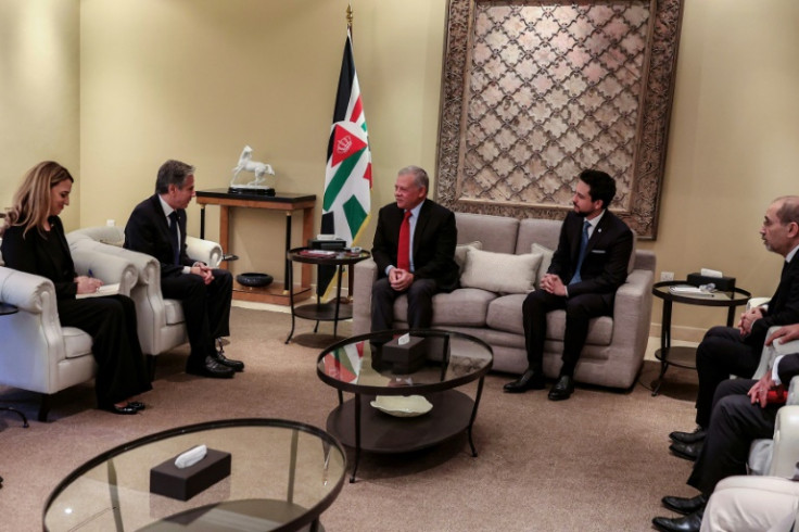 A handout picture released by the Jordanian Royal Palace shows Jordan's King Abdullah II receiving US Secretary of State Antony Blinken in Amman on January 7, 2024