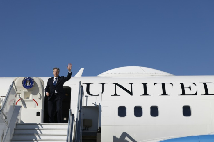 US Secretary of State Antony Blinken boards his plane in Amman, Jordan on his way to Qatar, the next stop on his Middle East tour seeking to avoid a wider conflagration in the Middle East
