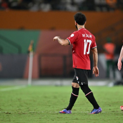 Egypt's Mohamed Salah walks off after picking up an injury against Ghana