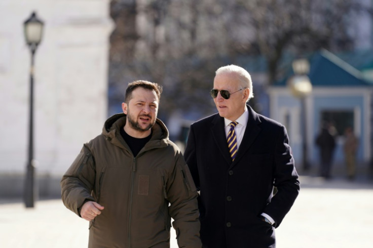 US President Joe Biden (R) paid a surprise visit to Kyiv and his Ukrainian counterpart Volodymyr Zelensky on February 20, 2023, but international causes are weighing on his reelection bid