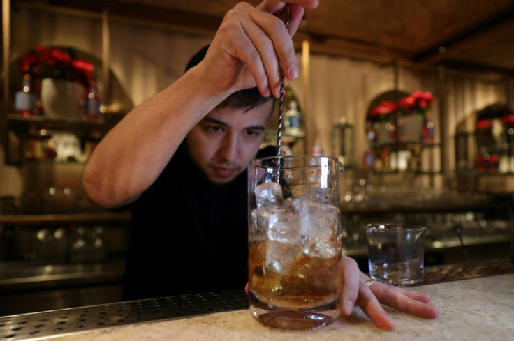 A bartender prepares a non-alcoholic cocktail in Riyadh